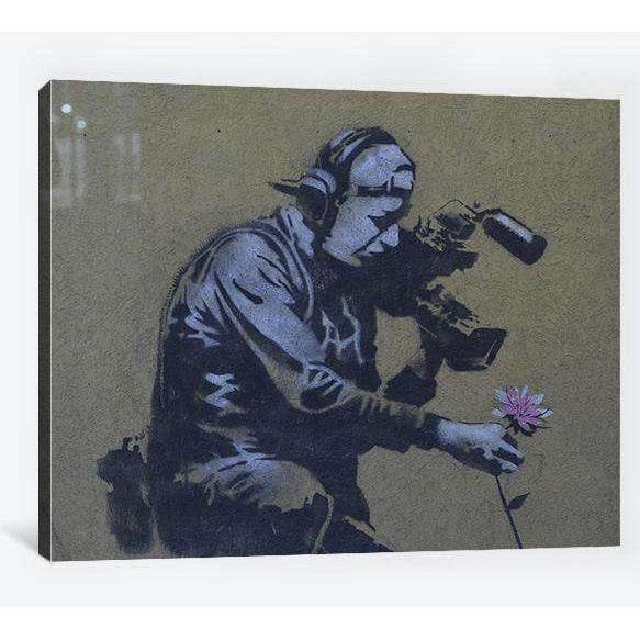 Banksy Camera man and flower - Ready to Hang Canvas PrintCanvas art arrives ready to hang, with hanging accessories included and no additional framing required. Every canvas print is hand-crafted, made on-demand at our workshop and expertly stretched arou