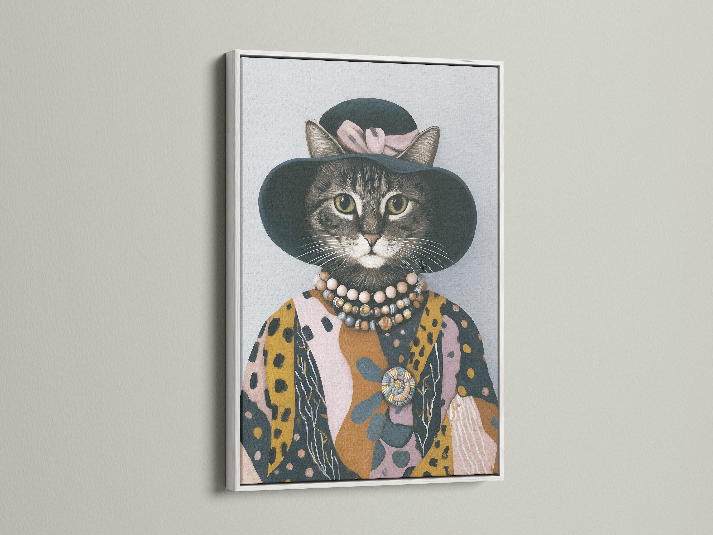 A dressed cat print displayed in a white frame. This whimsical wall art brings a smile to your face. The cat canvas print is perfect for a modern style. Add feline art to your living room.