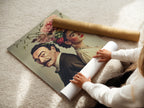 Woman carefully rolling a fine art poster paper print. The vintage portrait art is ready for framing. This floral crown artwork is perfect for home decor. Collectors and renters alike will enjoy this.