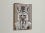 Fox Gentleman Canvas Print with an oak frame. This dapper animal wall artwork adds a touch of Victorian style to any study room. This artwork features a fox in a suit and top hat. The oak frame enhances the artwork's vintage charm. It is ideal for professionals academics and those with a fondness for unique decor.