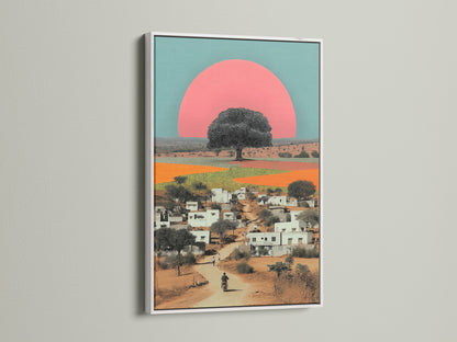 The Indian Village Canvas artwork print is beautifully presented in a white frame. The contrast enhances the retro sunset and desert landscape elements. Perfect for creating a serene atmosphere in any room with global inspired artwork.