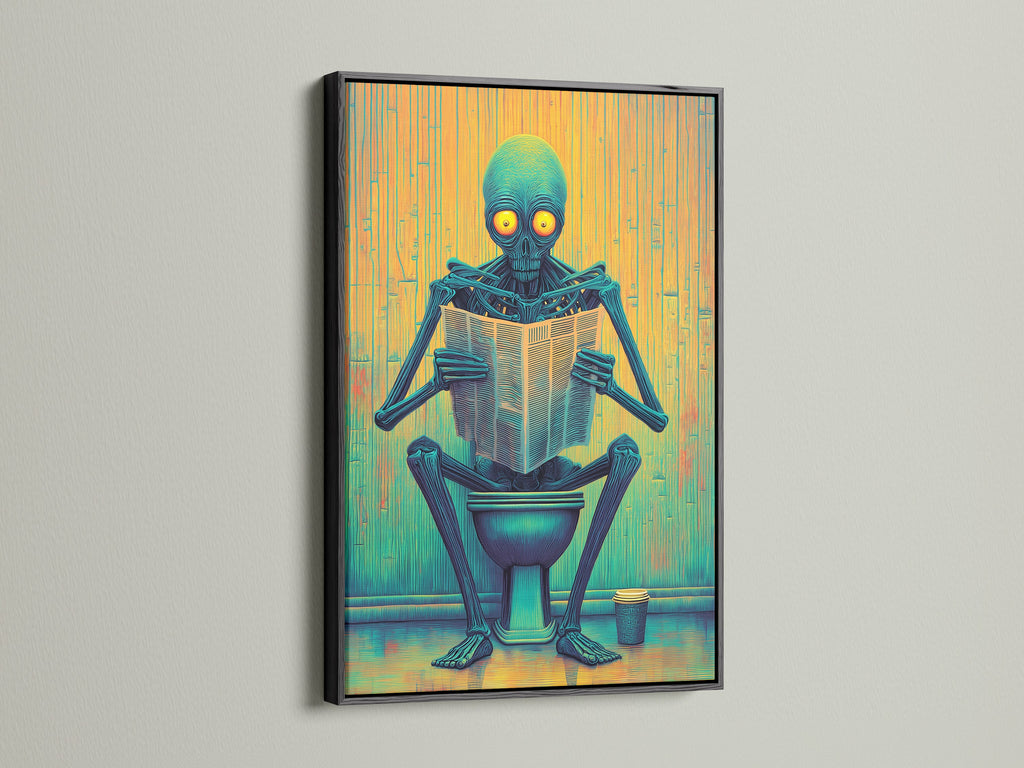 A black framed Alien on Toilet canvas print is presented. This unique wall art is perfect for man caves. The funny bathroom artwork adds a quirky touch. The sci-fi novelty poster is a great conversation starter. It fits eclectic and industrial styles well.
