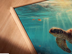 A close-up angled view shows a canvas print in a floating frame. The sea turtle artwork seems to float off the wall. This style adds a modern touch to ocean wall art. Perfect for a contemporary beach-inspired space.