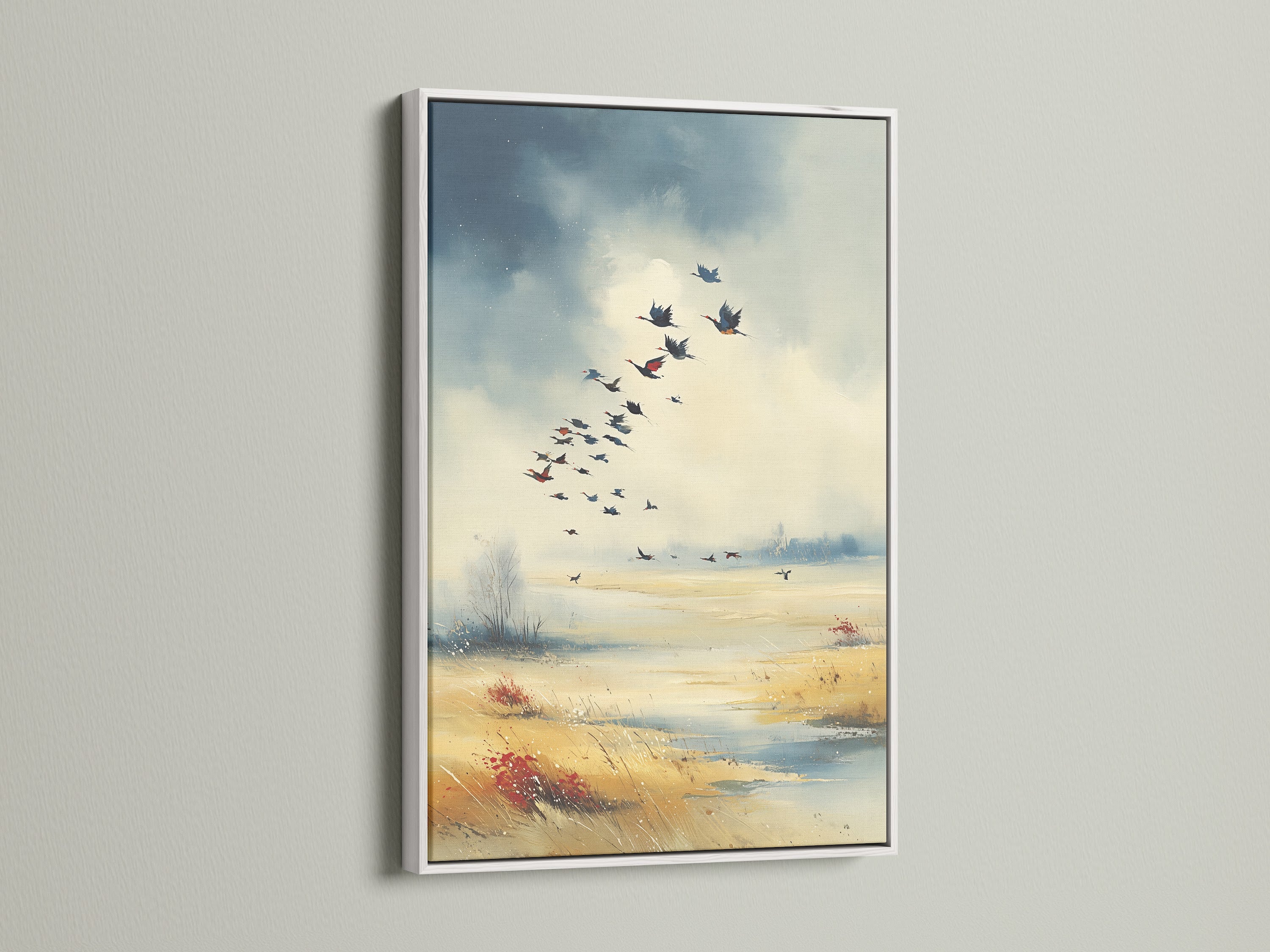 Birds in Flight canvas artwork with a white frame. This nature artwork brightens any room. The white frame offers a clean modern look. It's a great choice for entryway art and bedroom wall decor. This bird wall art brings a serene touch to your home.