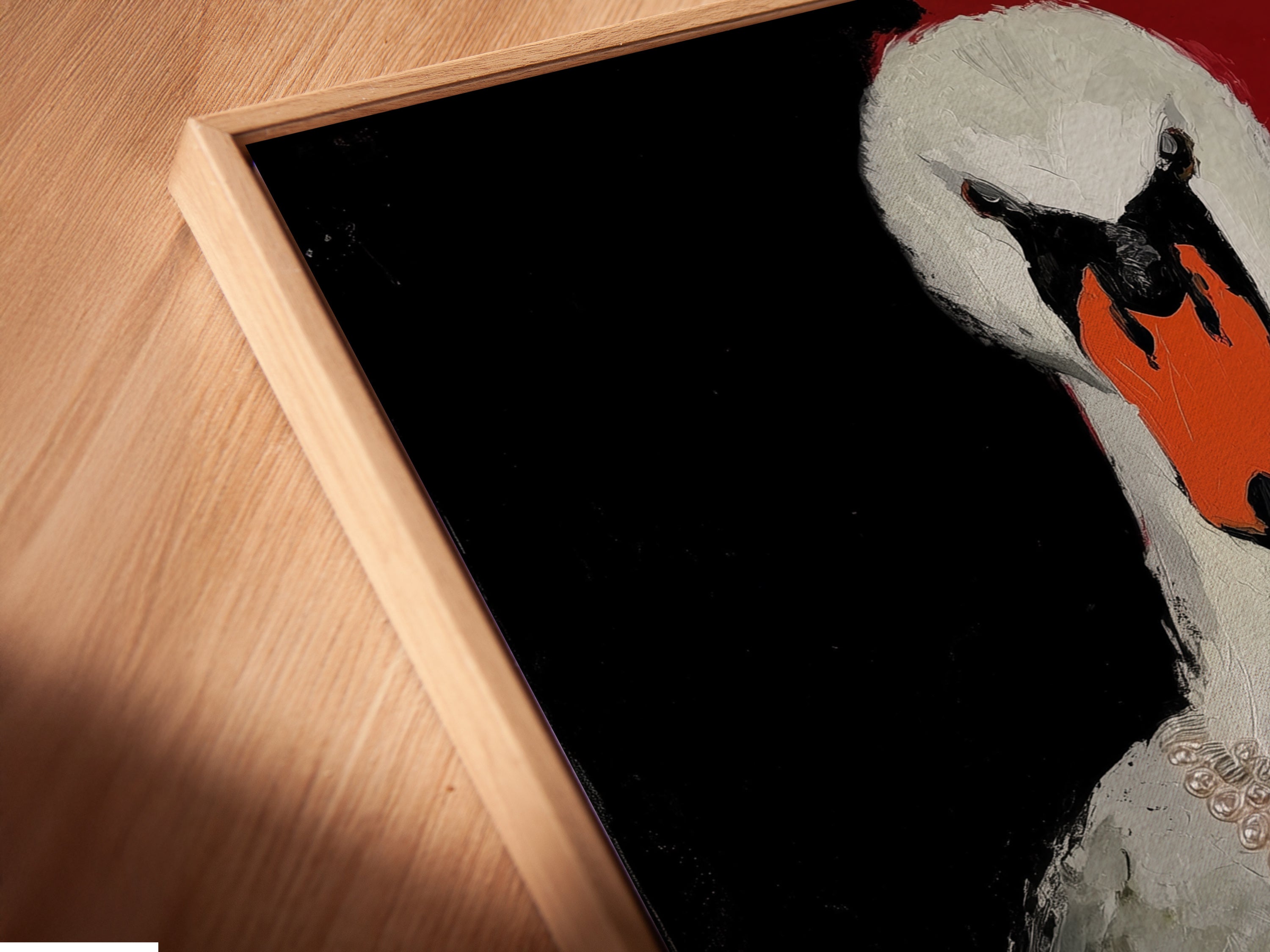 Close-up of a Swan Tea Party canvas print in a floating frame. The whimsical animal art features a surreal bird at a tea party. The floating frame gives a modern gallery look. Perfect for adding character to any room.