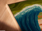A close-up shows a canvas print in a floating frame. The Ocean Wave Art Biblical Moses Parting Sea piece adds religious coastal decor. Perfect for minimalist Scandinavian or eclectic spaces. Ideal for living rooms bedrooms or offices. The ocean wall decor is a great choice.