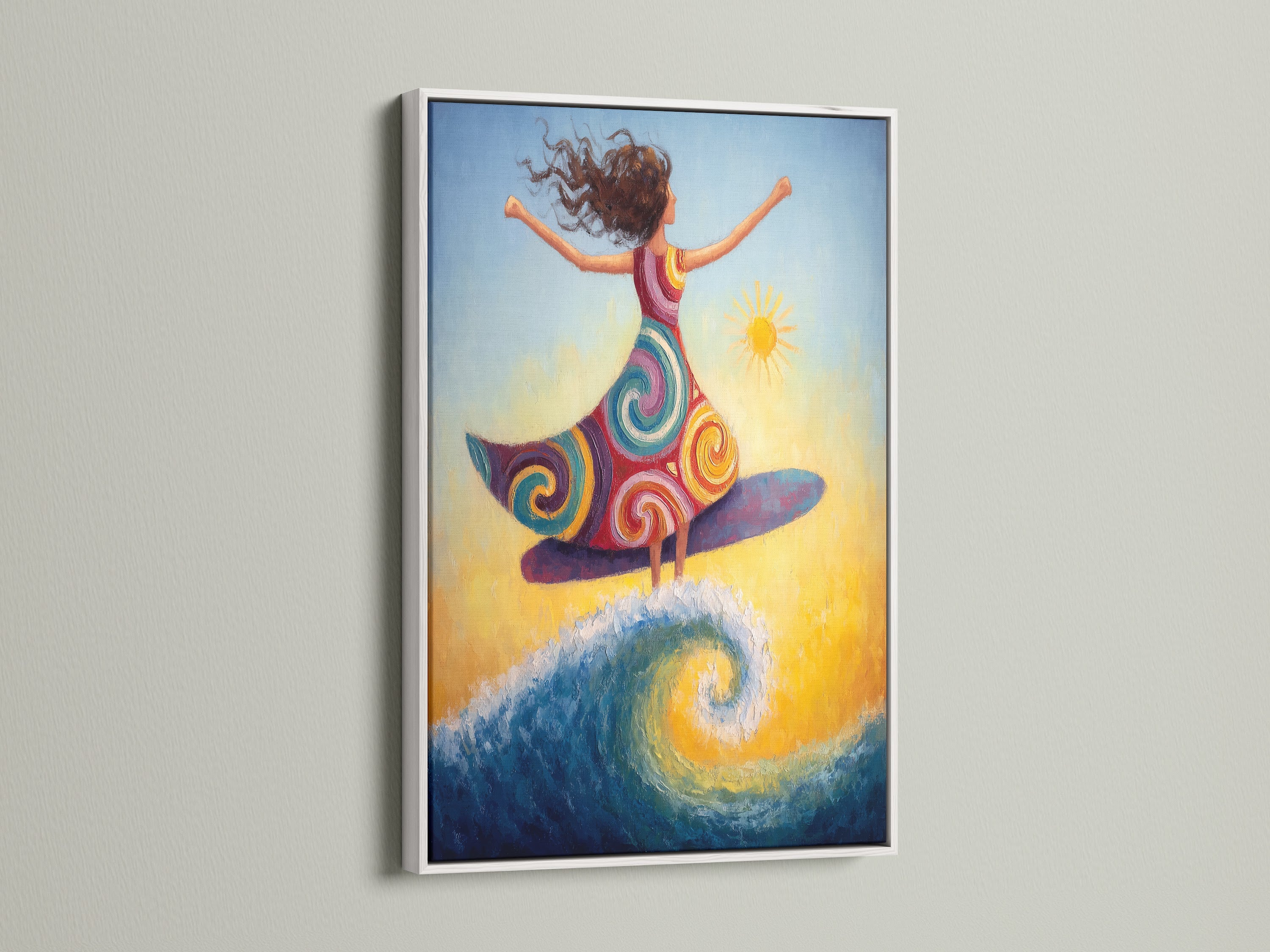 The surfing girl canvas artwork is elegantly framed in white. The clean white frame enhances the colorful artwork. It's perfect for creating a serene bedroom wall decor. This bohemian artwork is a great addition to cafes and surf shops.