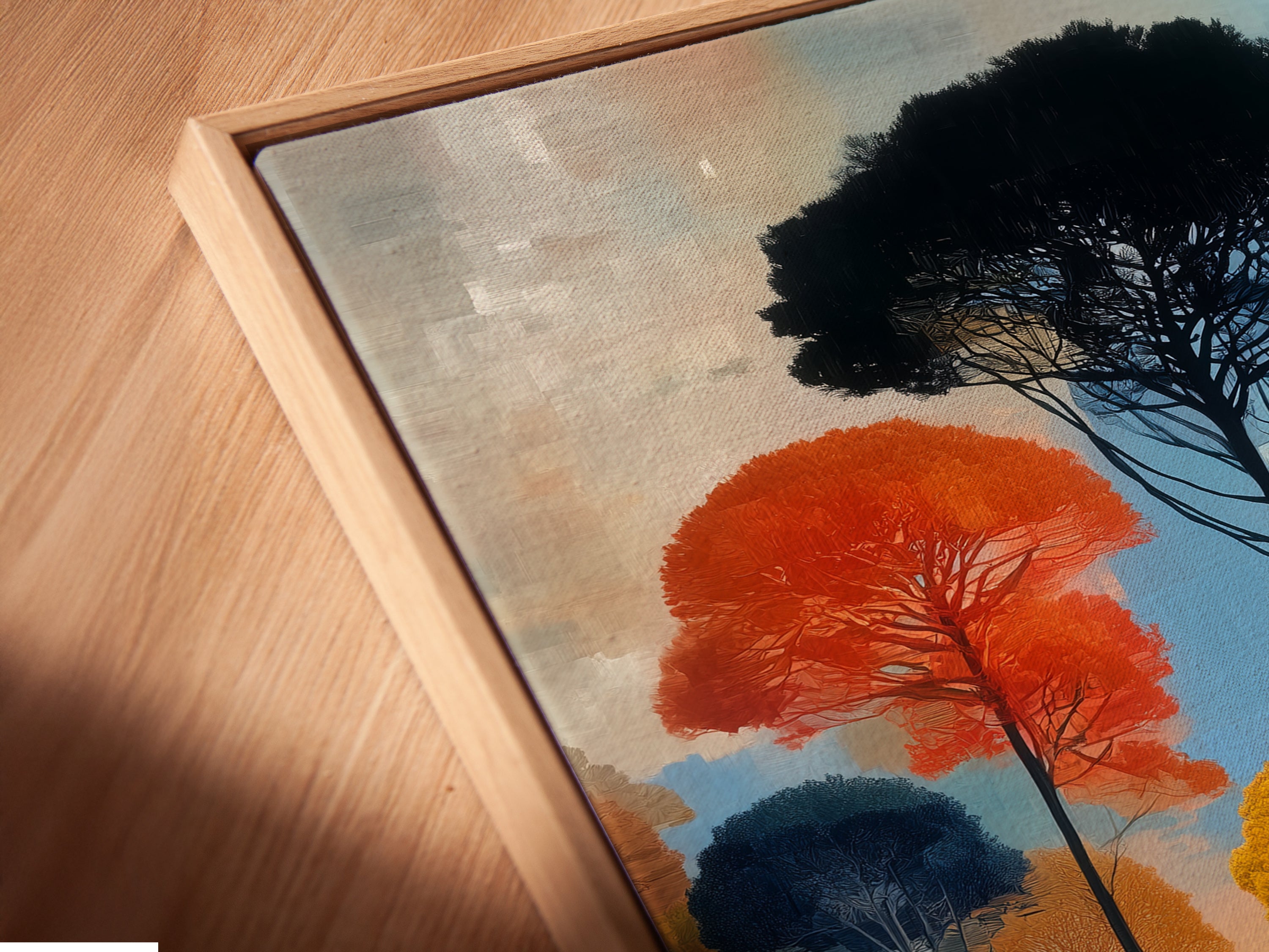 A close-up angled view shows a canvas print in a floating frame. This modern art piece features an Abstract Forest. The floating frame adds depth and sophistication. Perfect for showcasing colorful tree artwork in a unique way. A contemporary landscape print.