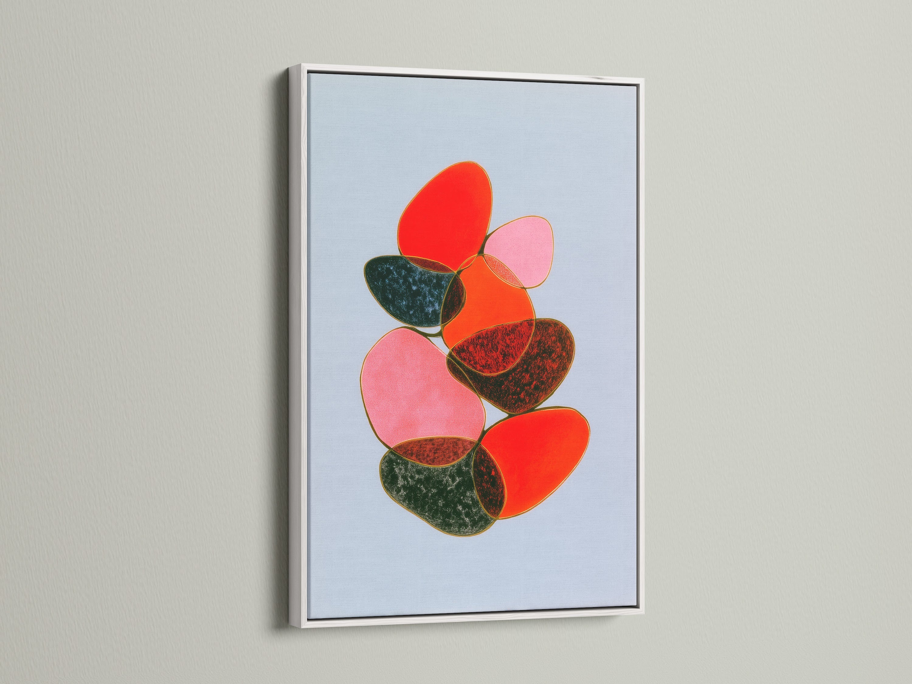 Discover the abstract stone art in a white frame. The white frame complements the red and pink tones of the artwork. Ideal for modern wall decor. A perfect balance art print for bedroom walls.