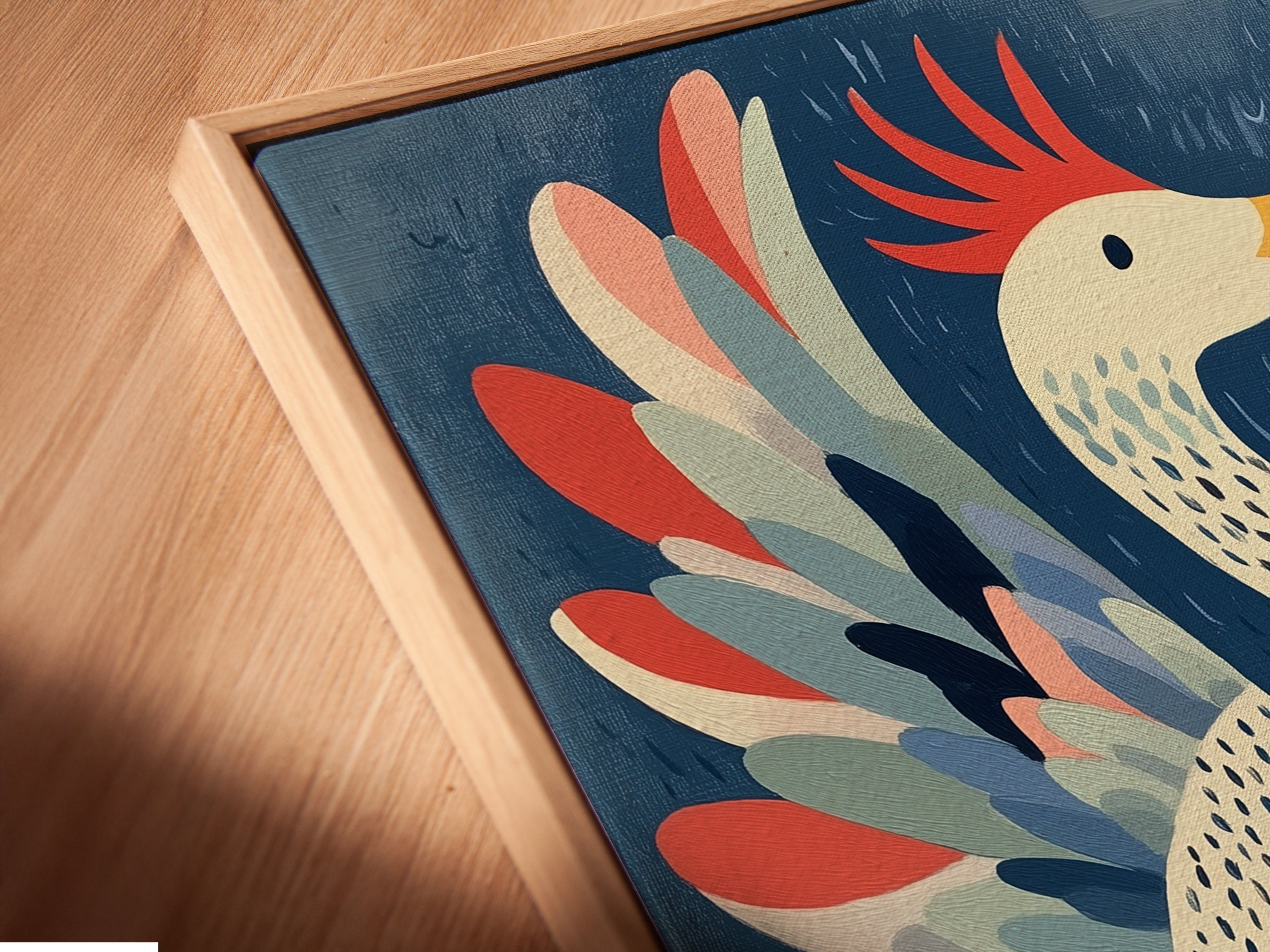 Close up of canvas print in a floating frame. The floating frame gives a modern gallery feel. The Phoenix Bird art is ready to hang. Enhance your home with this vibrant artwork.