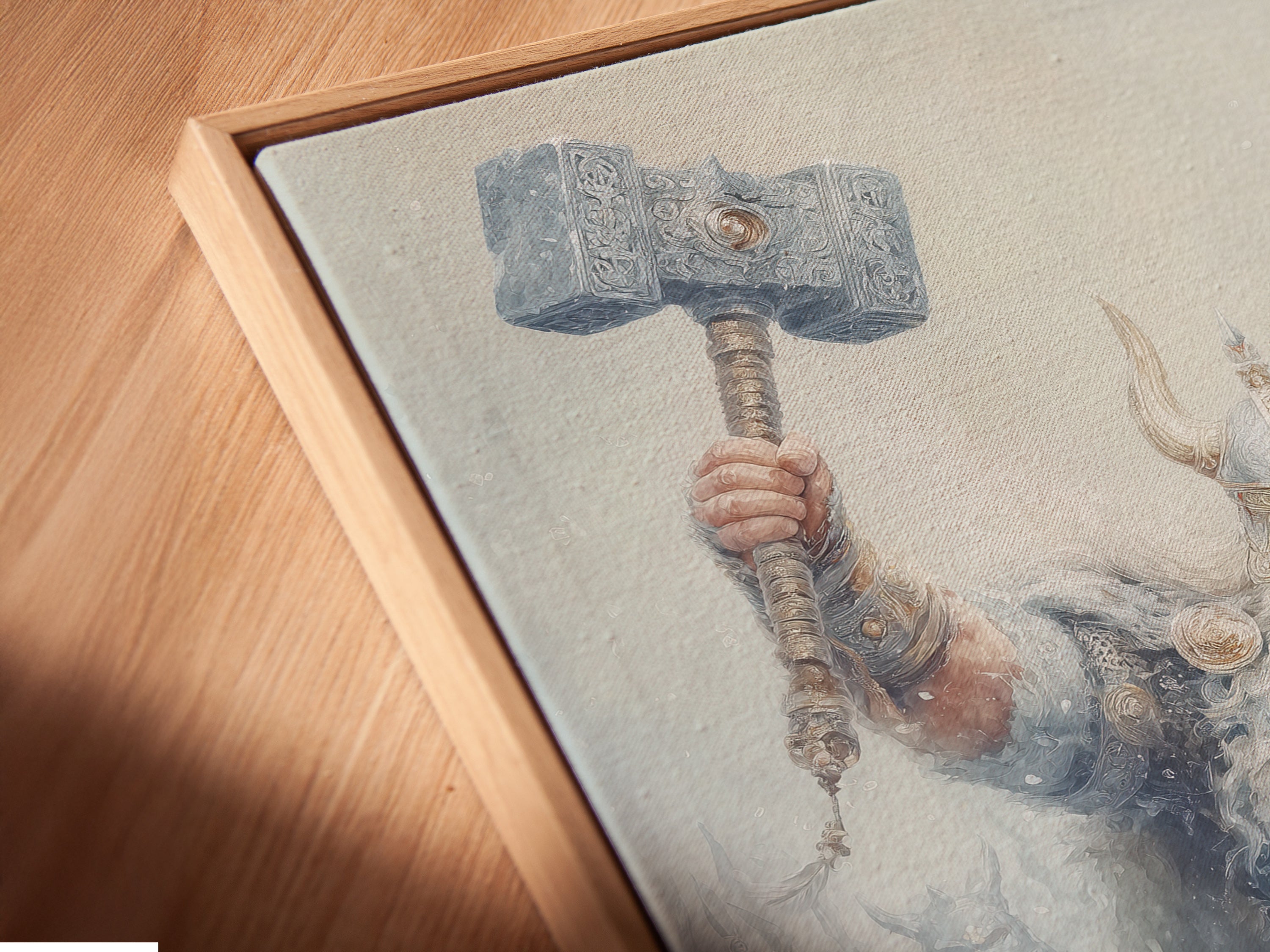 Close up angled view of a canvas print in a floating frame. This Viking Warrior artwork brings Norse Mythology to life. Perfect for game room decor. The floating frame adds depth to this fantasy artwork. The artwork fits industrial rustic and fantasy styles.