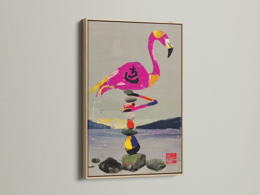 A zen stone stack canvas wall art piece is framed in a natural oak finish. The artwork features a flamingo balancing on rocks. This frame enhances the art's tropical aesthetic. It brings a sense of balance and mindfulness.