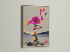 A zen stone stack canvas wall art piece is framed in a natural oak finish. The artwork features a flamingo balancing on rocks. This frame enhances the art's tropical aesthetic. It brings a sense of balance and mindfulness.