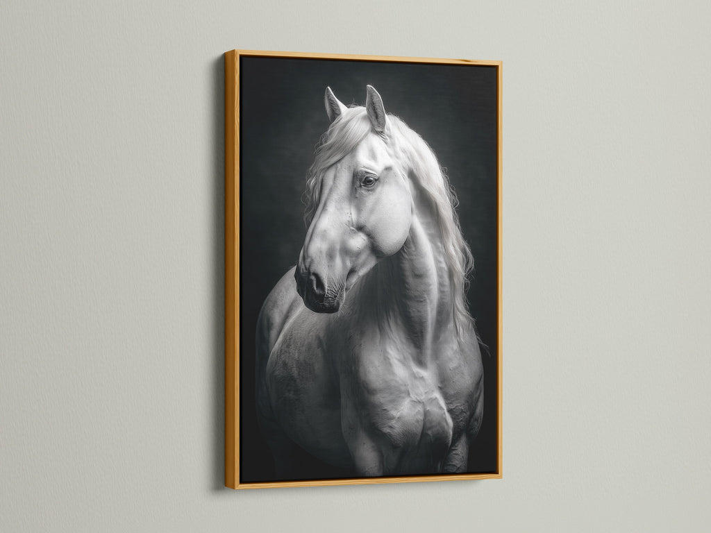 Stunning white horse artwork in a luxurious gold frame. This black and white animal photography adds elegance to any room. Perfect for equestrian decor or a horse lover gift. The animal canvas offers a touch of modern farmhouse style. Bring equine art into your home with this striking print.