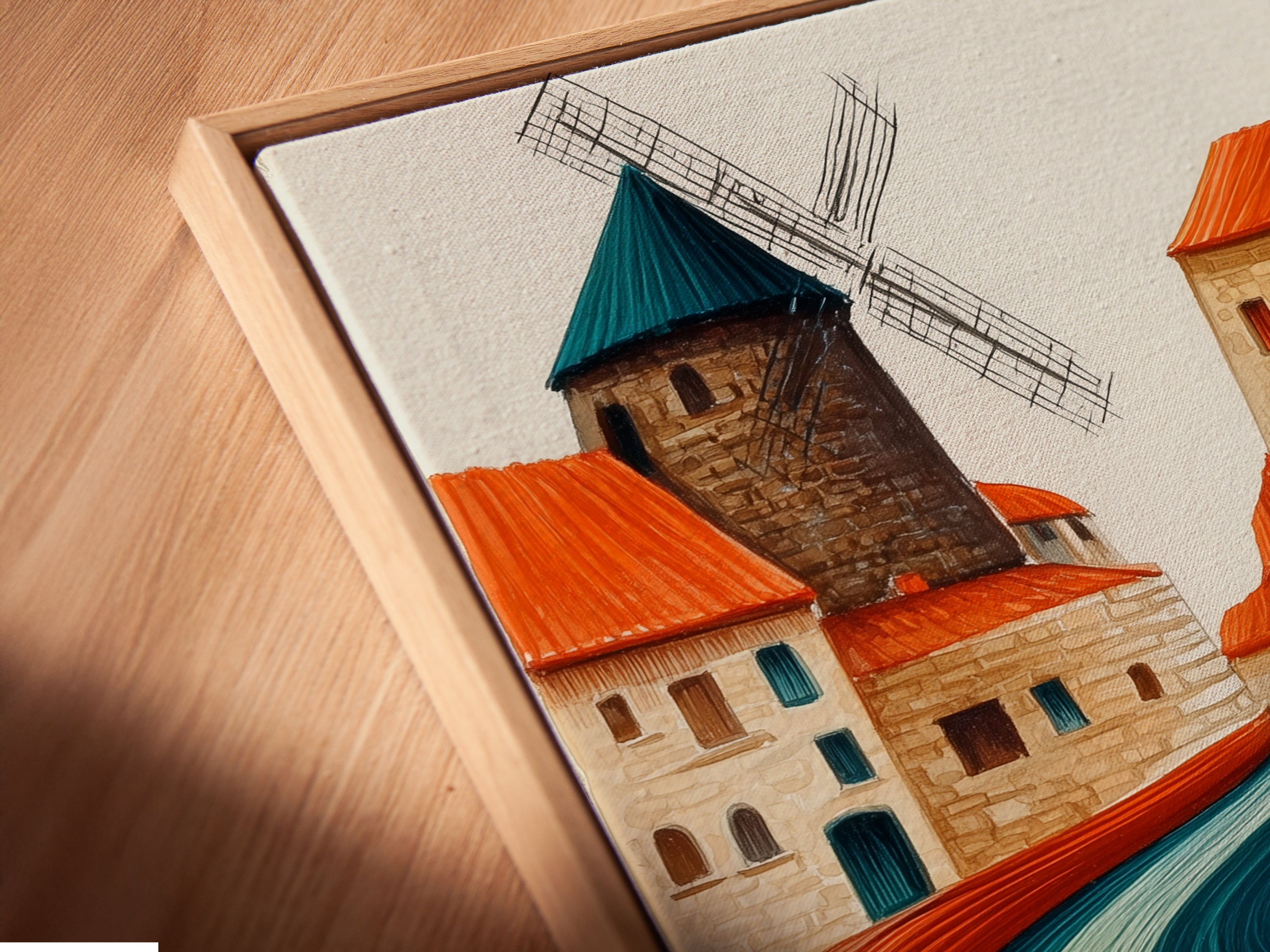 A close-up angle shows a canvas print of the whimsical village artwork in a floating frame. The abstract landscape features teal and terracotta colors. The floating frame enhances the art. This modern piece brings a unique touch to any space.