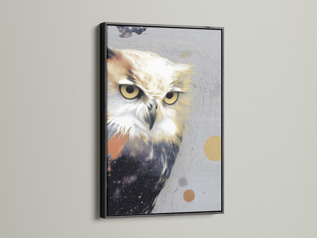 A dramatic owl artwork print is powerfully displayed in a black frame. The bold frame accentuates the modern wildlife canvas art. It adds a sophisticated edge to the contemporary bird artwork. It is perfect for making a statement in your office studio or creative space.