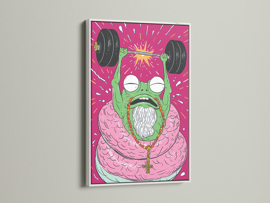 Fitness Frog art print with a white frame. The weightlifting gym wall art adds motivation. This quirky frog art is perfect for home gym decor. A motivational print for your workout space.
