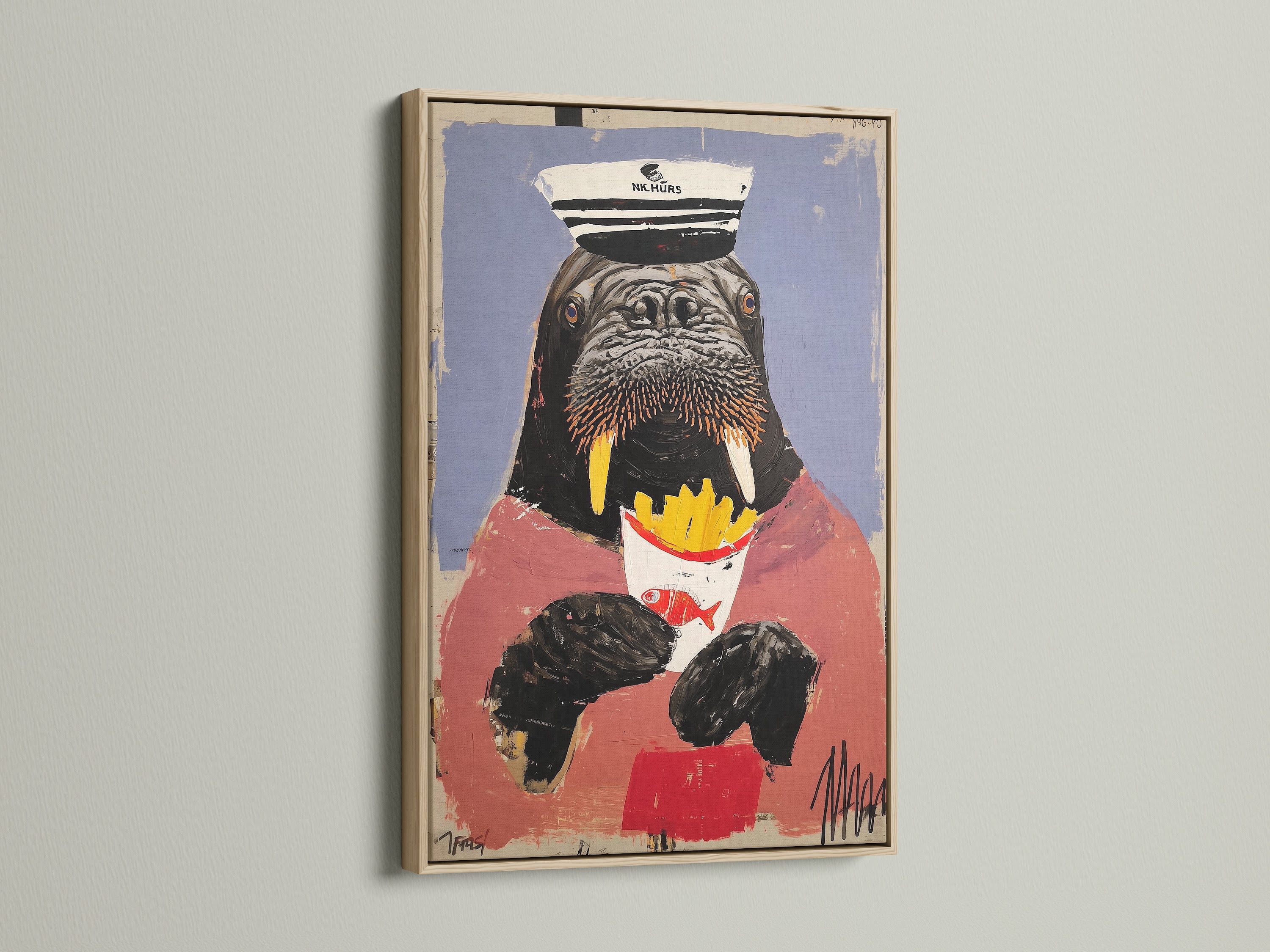 This walrus art print features an animal captain. The artwork is displayed in an oak frame. This quirky wall art brings a whimsical touch to your home. The sailor wall decor is perfect for a funny kitchen art or nautical theme.