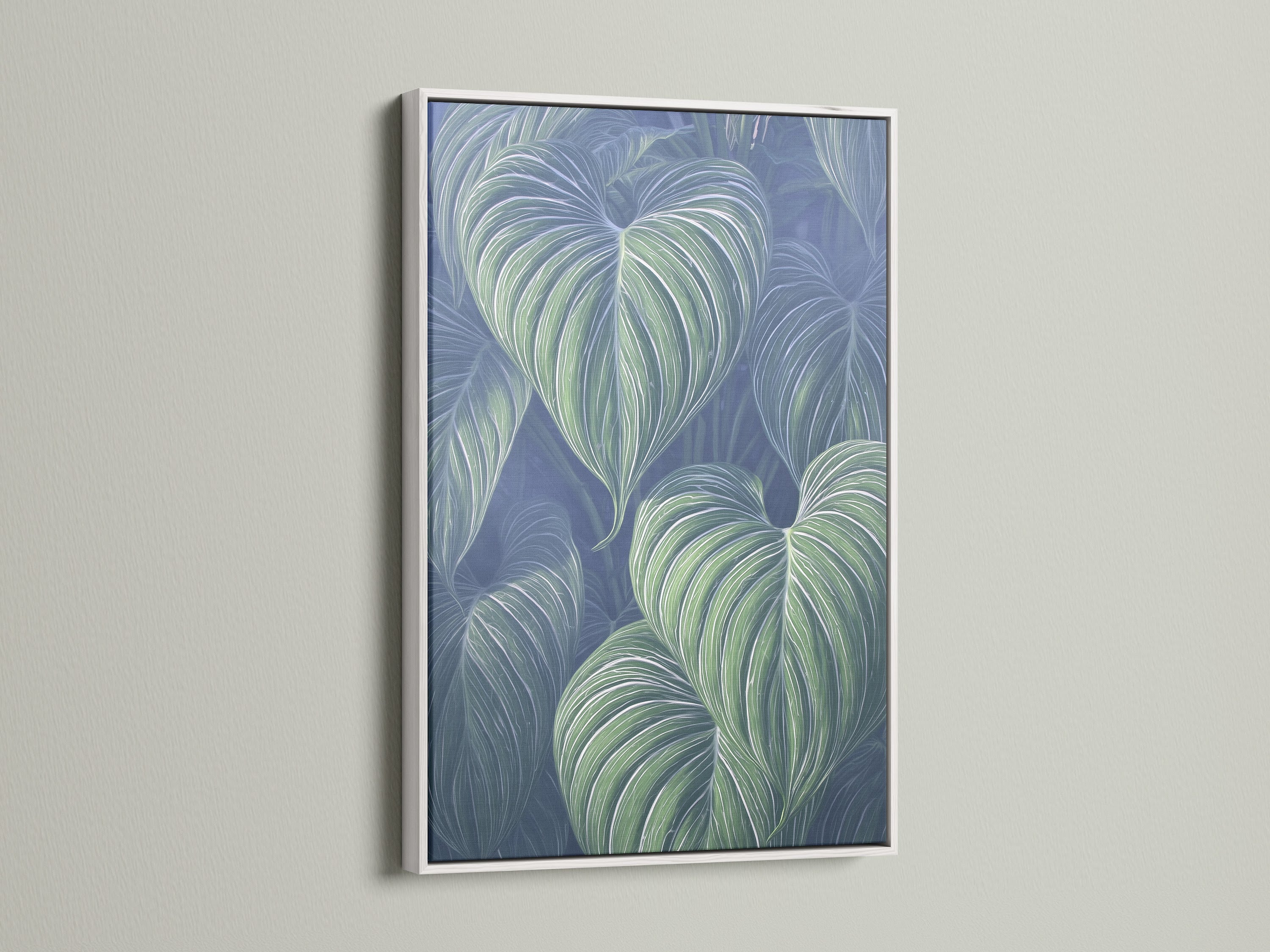 A white frame surrounds this botanical canvas. The tropical leaf art brings a fresh feel. The print enhances bedroom or office walls. The white frame is a stylish choice for this plant artwork.