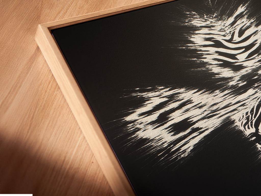 This is a close-up of a canvas print in a floating frame. The artwork is a Christian Cross Wall Art. The zebra pattern cross artwork adds a modern religious touch to any space. Ideal for living rooms bedrooms or offices. Perfect for those seeking faith-inspired decor.