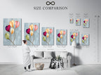 A size comparison chart is displayed in an interior setting. It shows the various sizes available for the floral watercolor canvas print. Helps visualize how the pastel botanical wall artwork fits in different spaces. Perfect for planning your bedroom wall decor or living room wall art.
