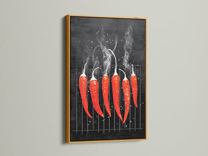 A red hot chili pepper artwork is framed in gold. The art is displayed on a clean white wall. The gold frame enhances the artwork's modern aesthetic. This culinary art is perfect for kitchens and dining rooms. This piece is ideal for food lovers.