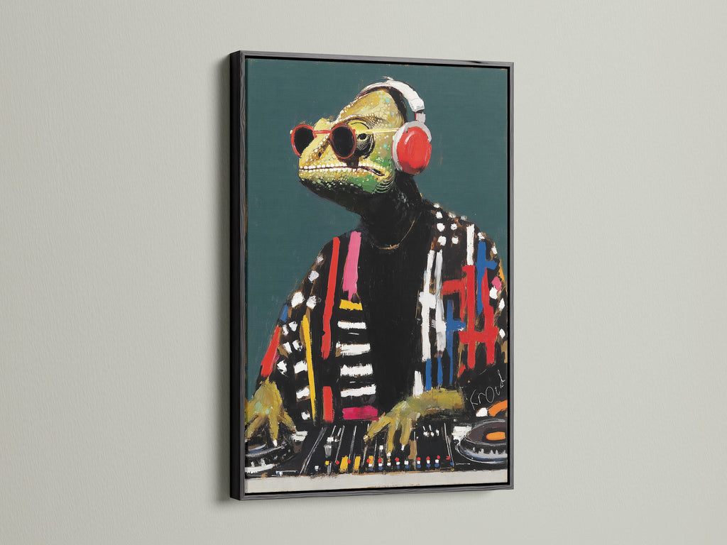 DJ Iguana canvas art in a black frame. This black frame emphasizes the modern animal canvas print. The dark frame makes the colors pop. It's ideal for a creative office or music room art setting. This is cool animal art.