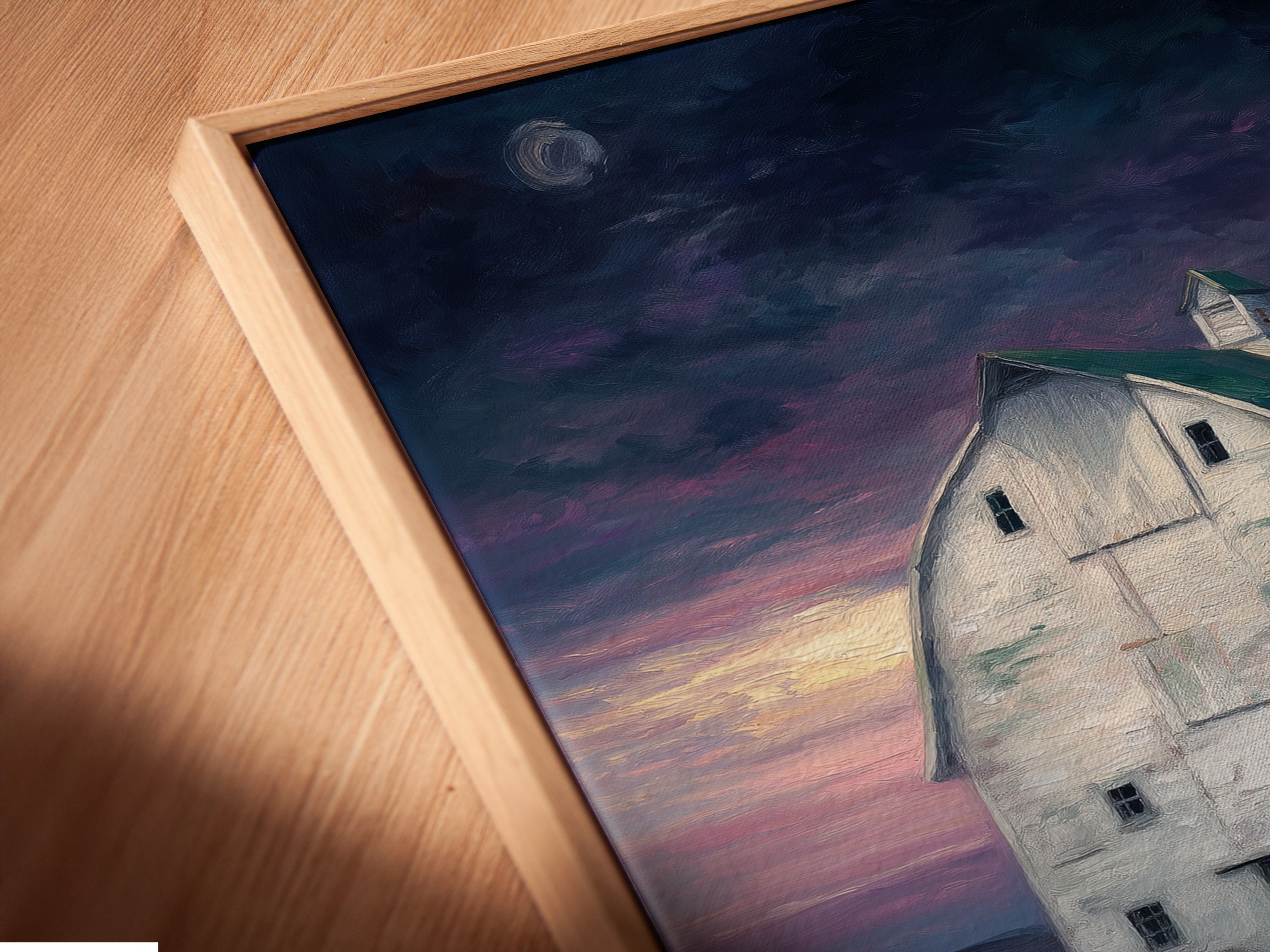 Close-up of a canvas print in a floating frame. The farmhouse canvas print enhances the rustic barn wall art. This country landscape artwork is ready to hang. The floating frame adds depth to your kitchen art. This farmer gift is perfect for any country home setting.