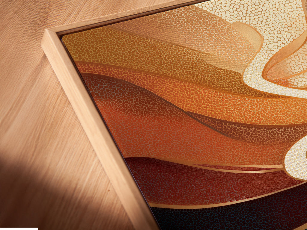 Close-up angled view of a canvas print in a floating frame. The Abstract River artwork showcases a teal and orange flow. The floating frame gives the artwork a sophisticated gallery-like appearance. Perfect for modern decor.