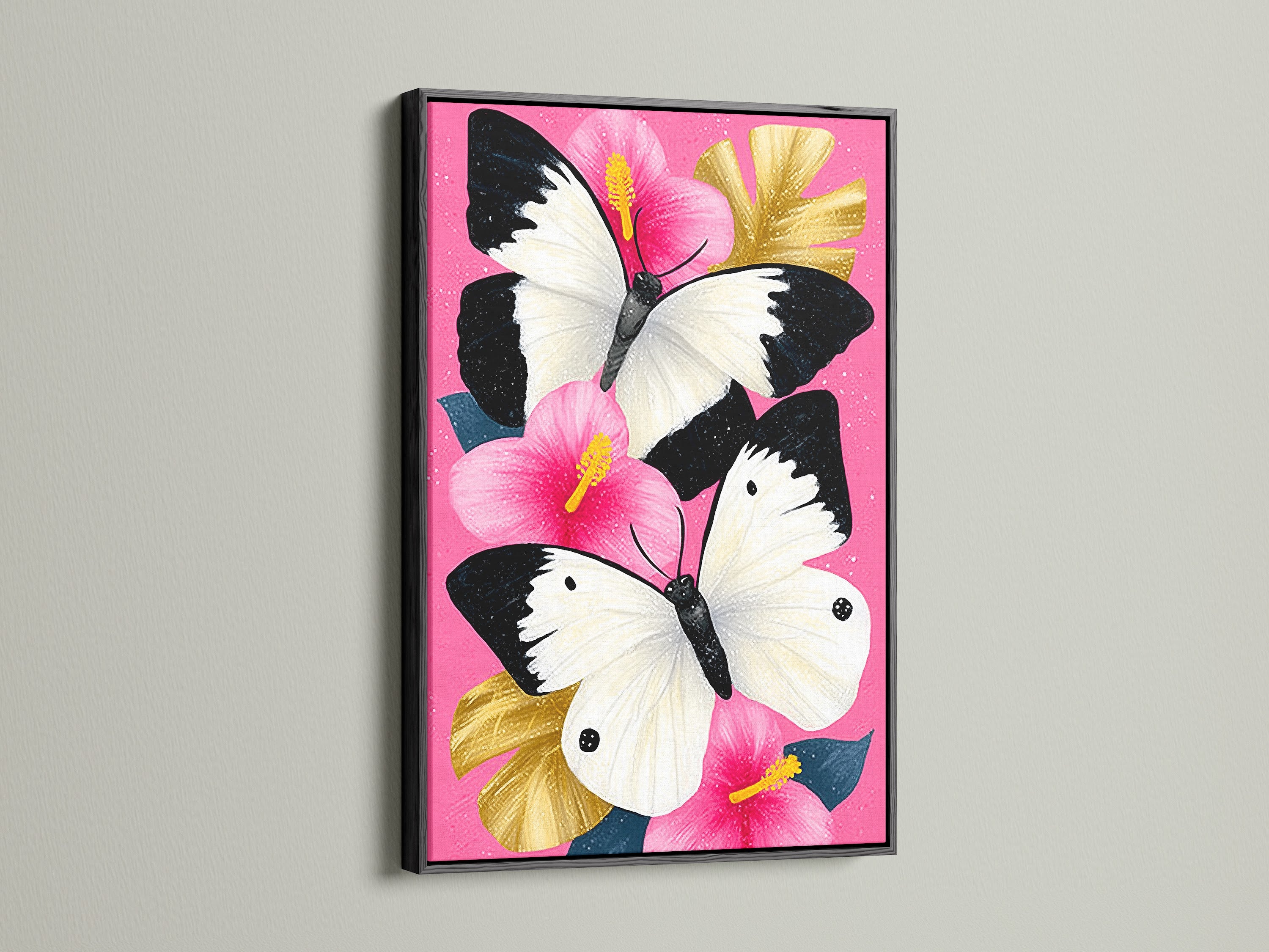 Butterfly Canvas Artwork with a Black Frame. The artwork features a pink hibiscus wall art with white butterflies. This vibrant art is perfect for summer decor. Elevate your space with this unique and stylish piece.