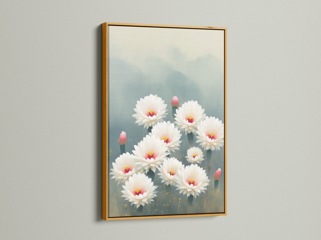 Cactus Flower art piece in a gold frame. The desert bloom print is perfect for adding a touch of floral beauty to your home. This botanical wall art suits minimalist modern and southwest decor styles. It's an ideal gift for plant lovers. The neutral tones enhance any space.