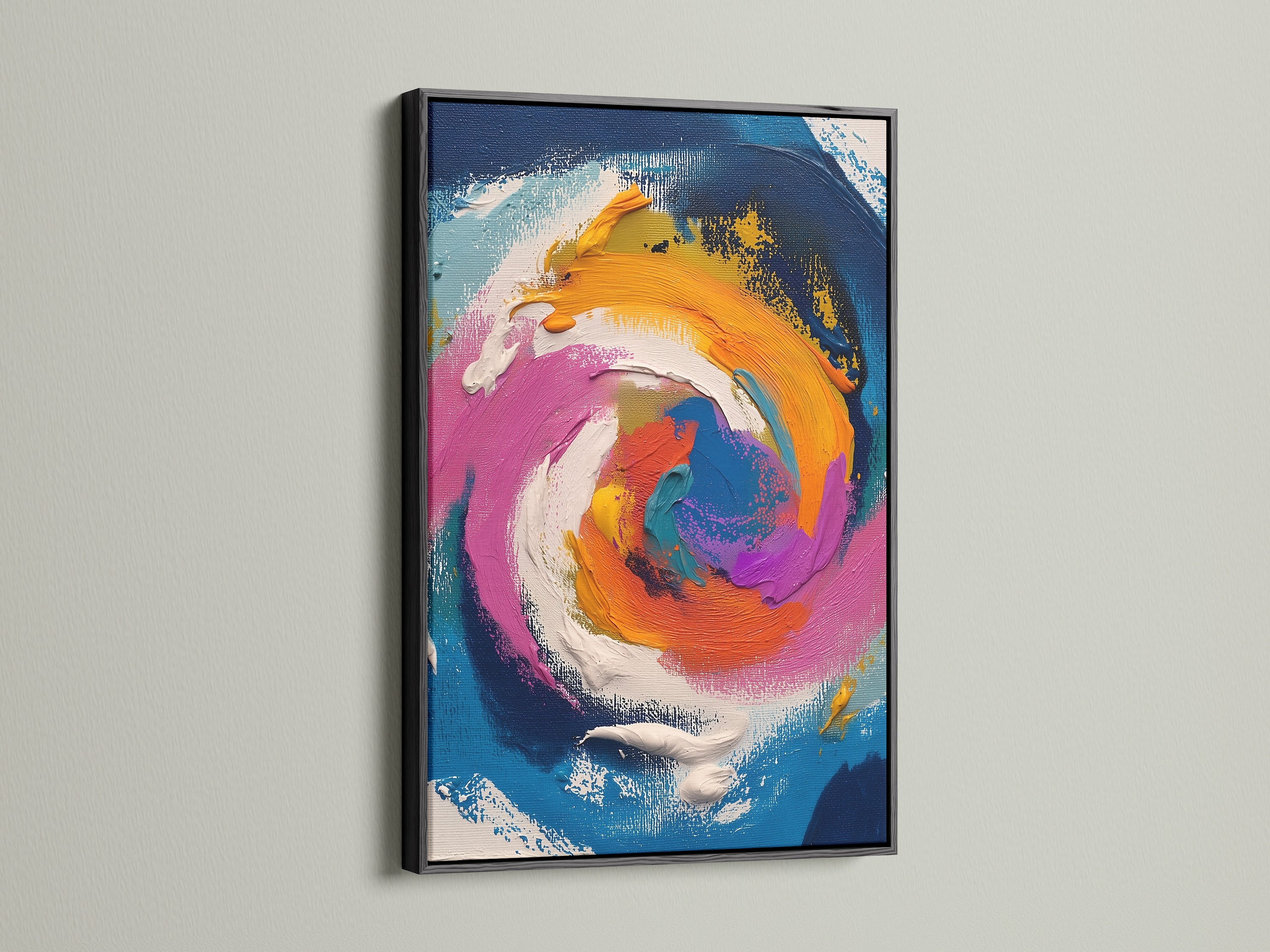 This image features an abstract swirl artwork in a sleek black frame. The contrast between the colorful artwork and the black frame is striking. The artwork will add a touch of sophistication to your living room or office.