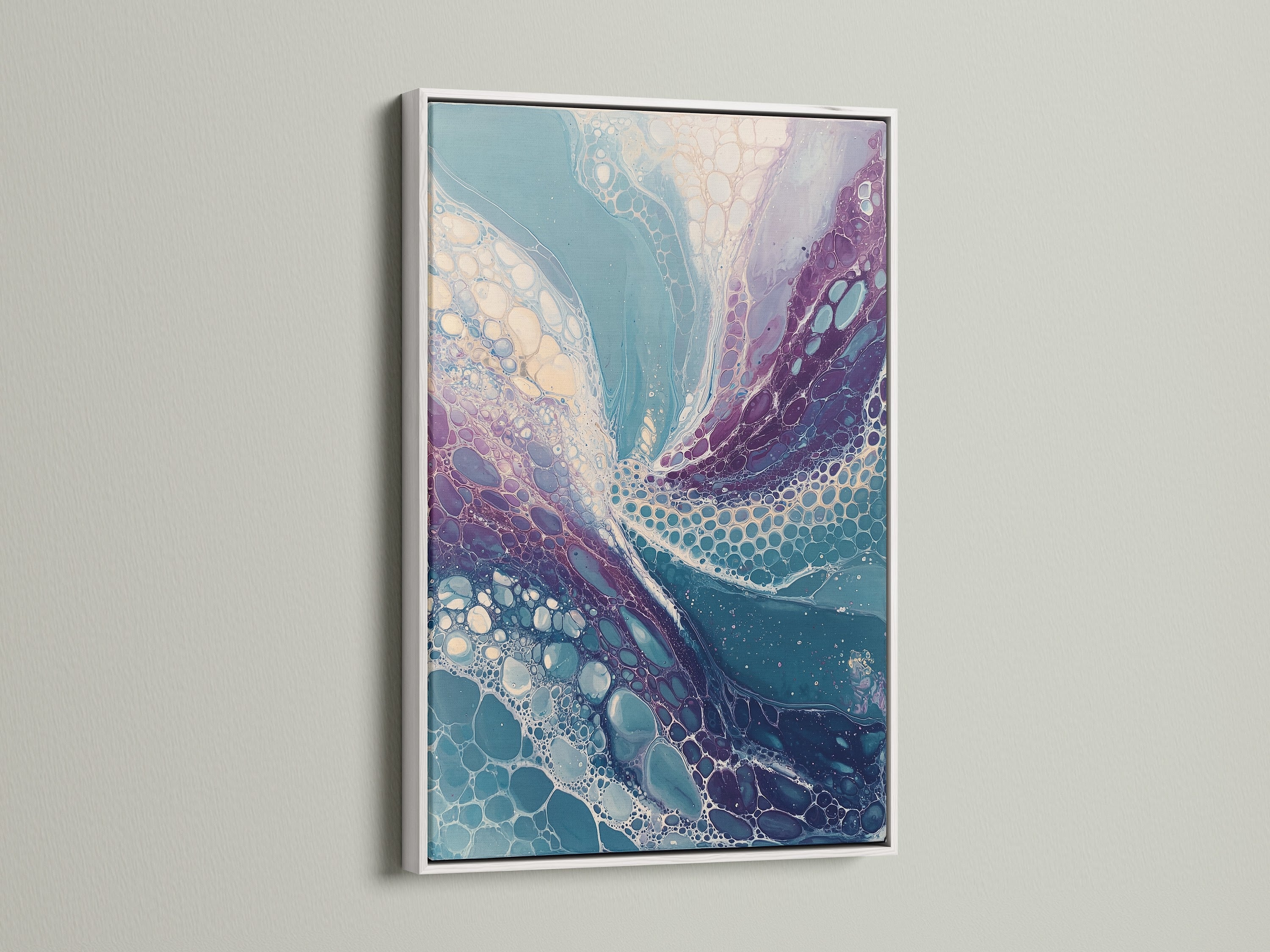 An abstract fluid art piece is beautifully showcased in a white frame. The teal and purple tones blend seamlessly. This modern canvas art adds a touch of sophistication to any wall. Perfect for contemporary home art. Enhance your decor with this elegant art print.