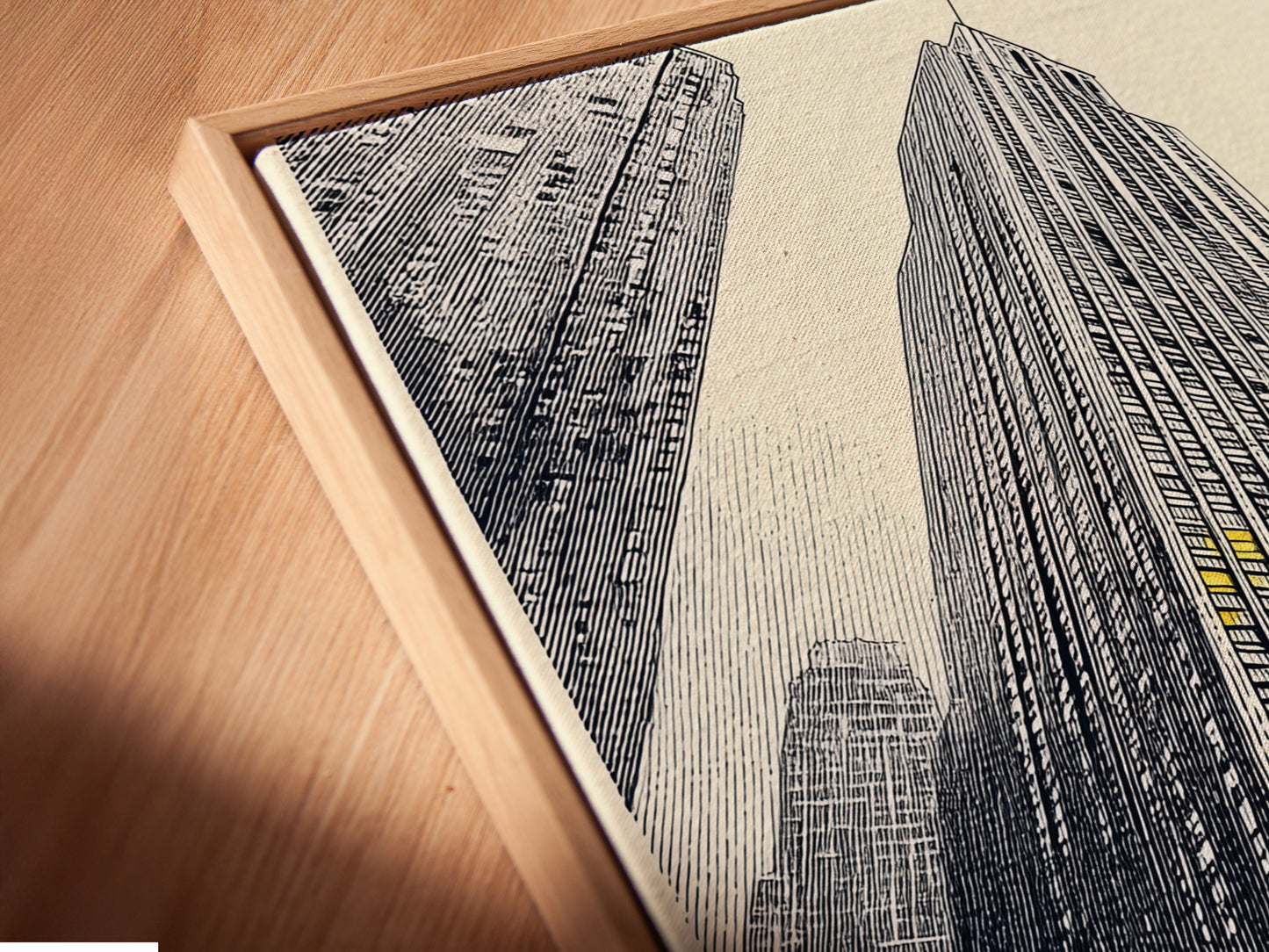 A close-up angled view displays a canvas print in a floating frame. The artwork features an urban cityscape. The modern skyscraper print adds depth and sophistication to any wall. Perfect for contemporary spaces and urban decor.