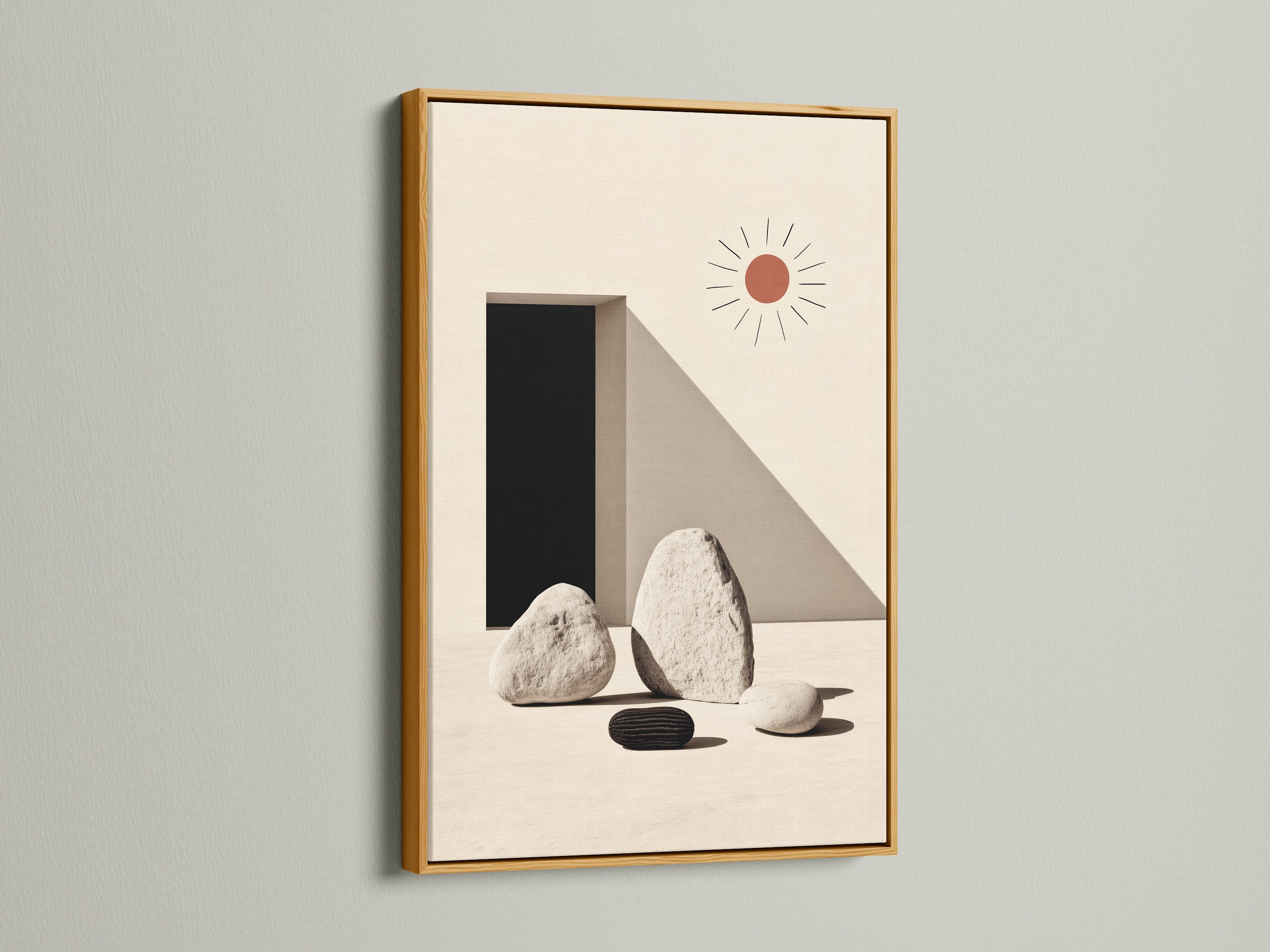 Minimalist stone geometric artwork in a gold frame. The neutral color palette complements any modern space. Perfect for adding a touch of zen to your office or home. The gold frame enhances the artwork's sophisticated appeal. Elevate your wall decor with this stylish art print. A simple yet elegant addition to any interior.