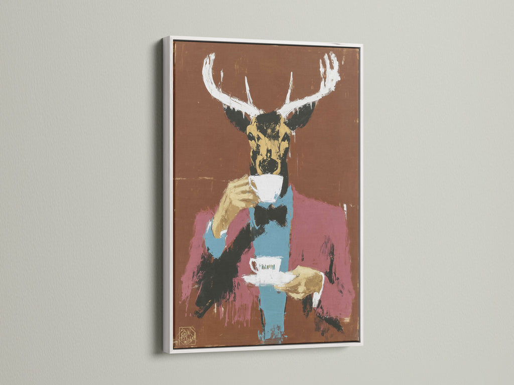 A white frame highlights a whimsical deer artwork. It's a modern folk art print suited for contemporary spaces. It can elevate your office wall decor or home art. Shop our animal canvas print collection for quirky wall decor. This gentleman animal art is a unique addition to any room.