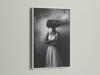 The monochrome surreal woman artwork is presented in a white frame. This fine art print offers a contemporary look. The black and white photography enhances any room. Choose this for artistic wall decor