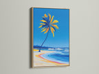Palm Tree Beach artwork displayed in an oak frame. The oak frame enhances the tropical coastal canvas print. This ocean wave wall art is perfect for adding a nautical touch to any room. See how this seaside artwork complements a variety of interior settings.