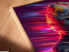 Close-up angled view of a Formula Racing canvas print. The artwork is set in a floating frame. This modern automotive wall art is perfect for man cave decor. The neon speed design adds a vibrant touch.
