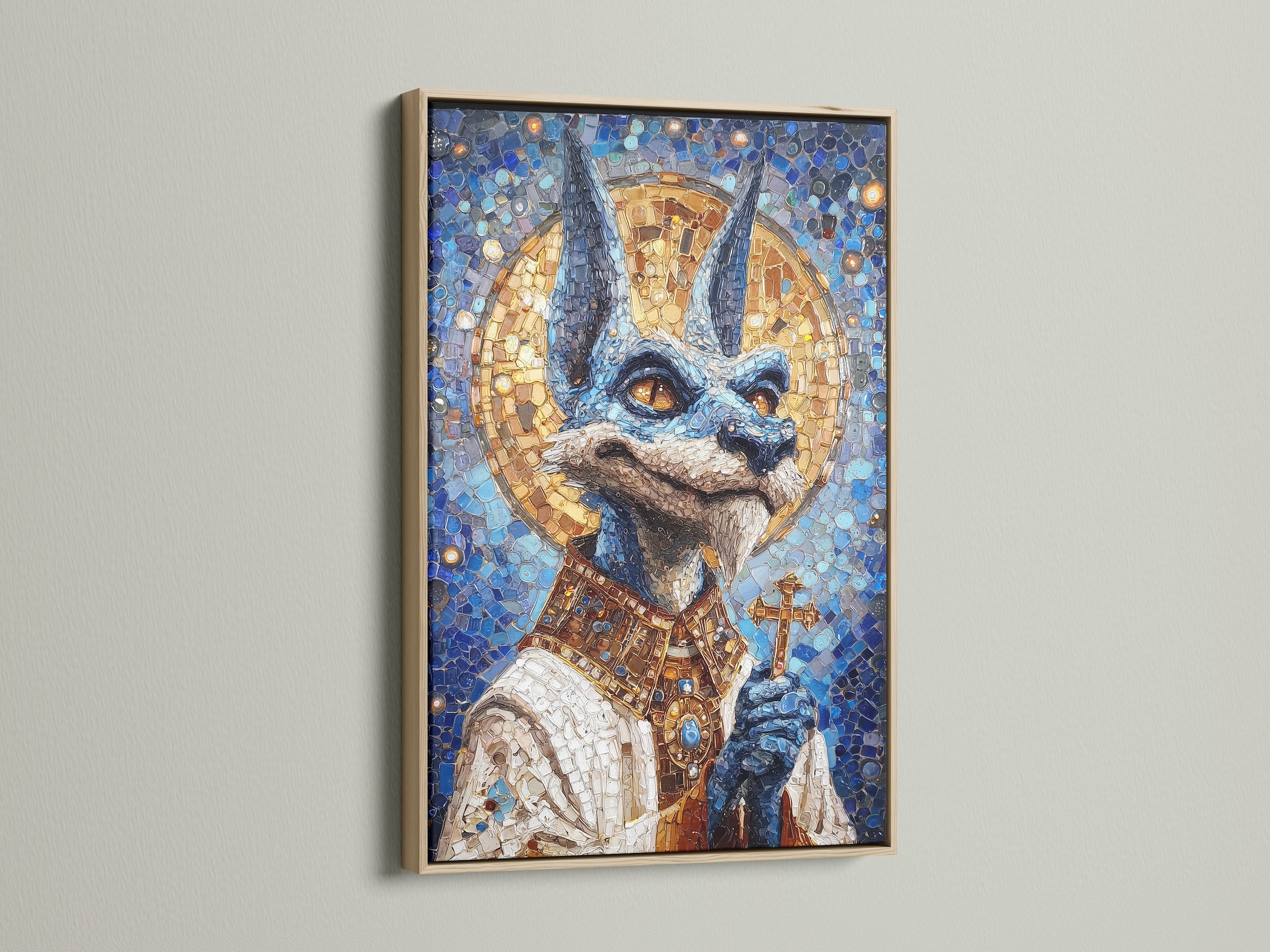 Anubis Mosaic Artwork Print with an oak frame. This artwork is an Egyptian God Wall Art piece. The art features blue and gold religious imagery. Perfect gothic art for living room wall art. It enhances eclectic or vintage style.