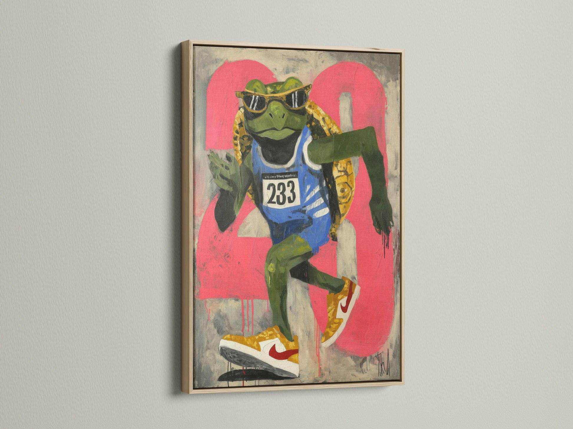A vibrant frog art print in an oak frame is showcased. This retro sports art piece brings an urban vibe. It is ideal for youth rooms or teen rooms. Consider this unique street art canvas. It will add character to any space. Great for homeowners renters and interior designers.