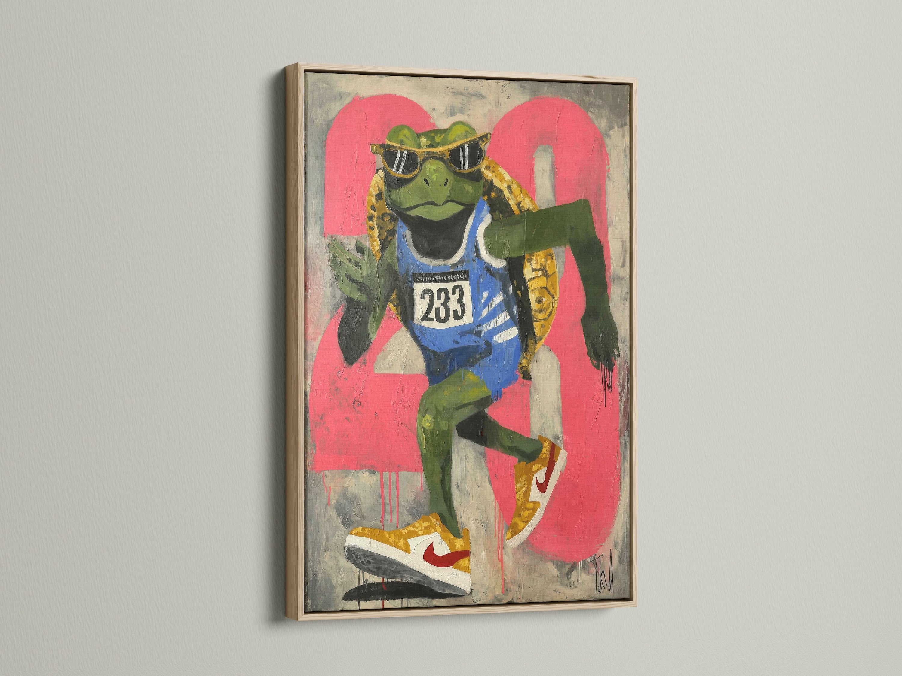 A vibrant frog art print in an oak frame is showcased. This retro sports art piece brings an urban vibe. It is ideal for youth rooms or teen rooms. Consider this unique street art canvas. It will add character to any space. Great for homeowners renters and interior designers.