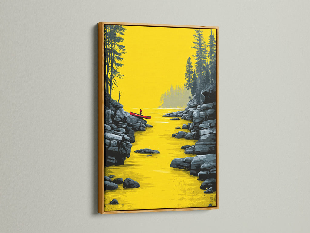 River Kayak Canvas Artwork with a Gold Frame. The artwork features a serene river scene with a lone kayaker. Perfect modern landscape artwork for your office or living room. Elevate your space with this golden yellow wall art today.