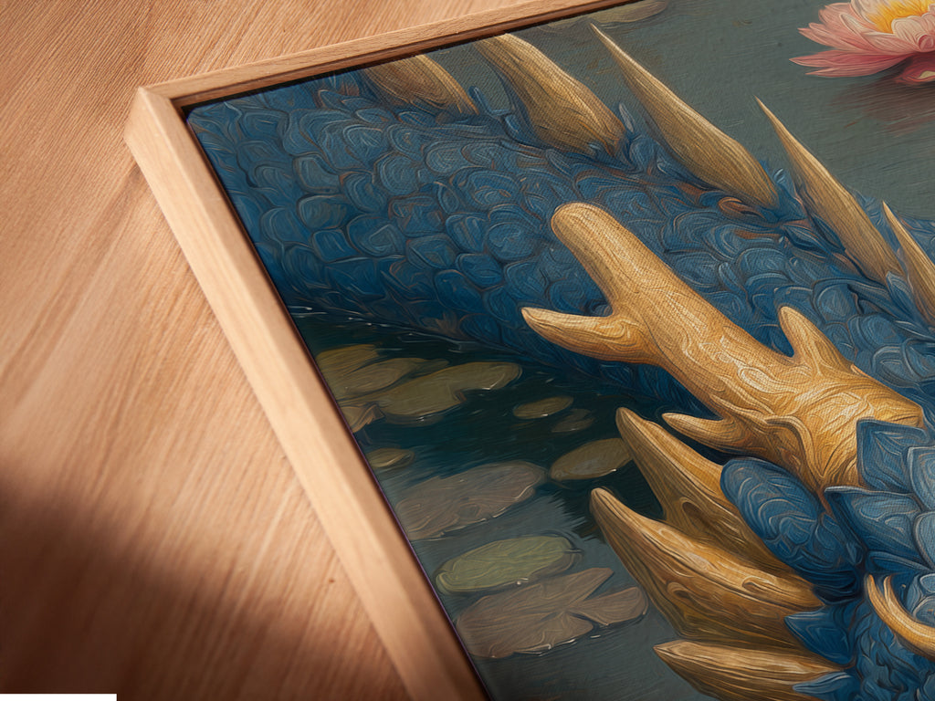 Close-up shot of a canvas print in a floating frame. The artwork features a blue dragon in a pond with pink lotus flowers. The floating frame gives the art a modern gallery look. Discover the beauty of framed art.