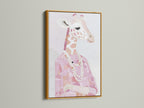 A gold frame displays a Giraffe Portrait Canvas Print. The pink animal print adds a touch of elegance. Fashion giraffe art is adorned with a pearl necklace. Gold frame complements the blush pink art. This stylish animal art is luxurious and refined.