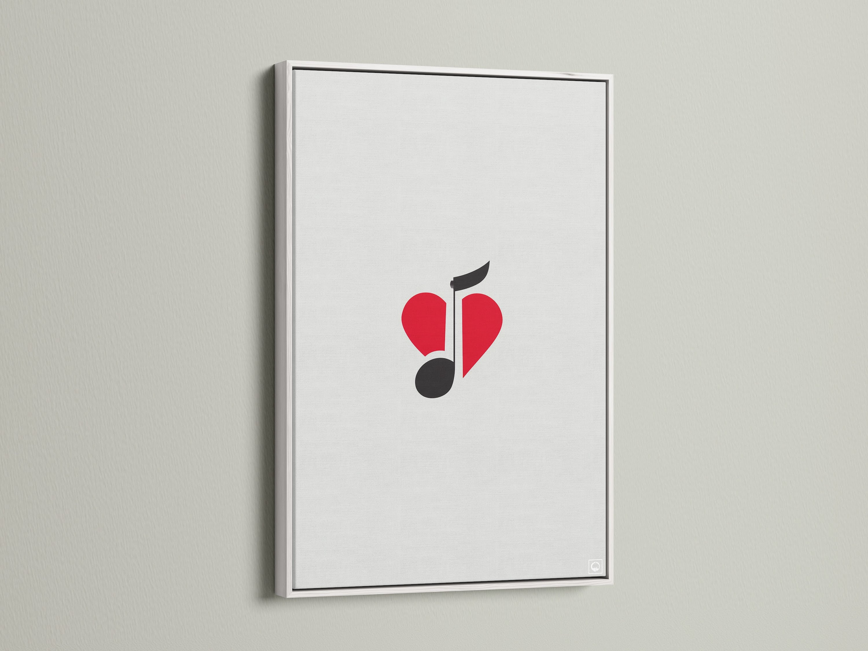 The music note heart art is framed in a white frame. This minimalist piece adds a touch of modern elegance. It will enhance any room. The red and black colors create a striking visual impact.