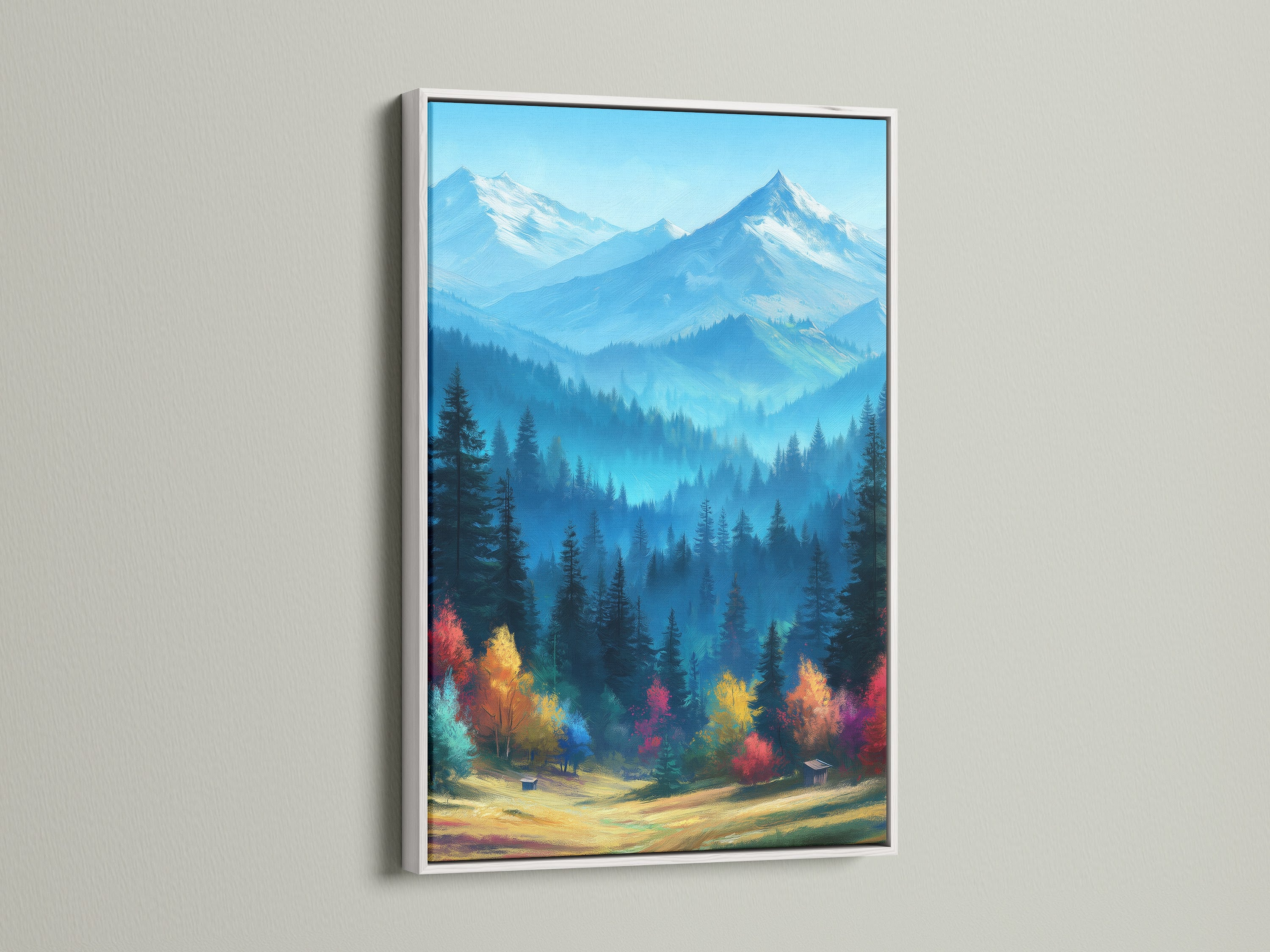 Mountain Landscape Wall Art with a White Frame. This colorful nature artwork features an autumn forest and blue mountains. It's a perfect addition to any cabin decor. The white frame enhances the artwork's bright colors. Bring a touch of wilderness art into your home. Enjoy the serene beauty.