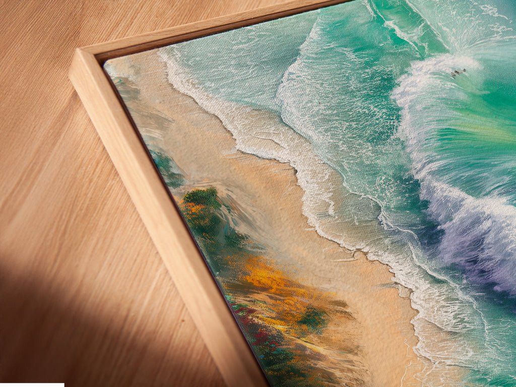 A close up angled view shows a canvas print in a floating frame. The art captures ocean waves in stunning detail. This style enhances the artwork making it ideal for modern interiors. It creates a focal point.