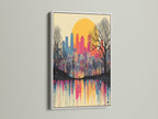 A white frame enhances this vibrant City Skyline Canvas Print. The artwork showcases a sunset over an urban landscape with colorful drip paint. This modern cityscape is perfect for office wall art or home decor. Its contemporary style will brighten any room.