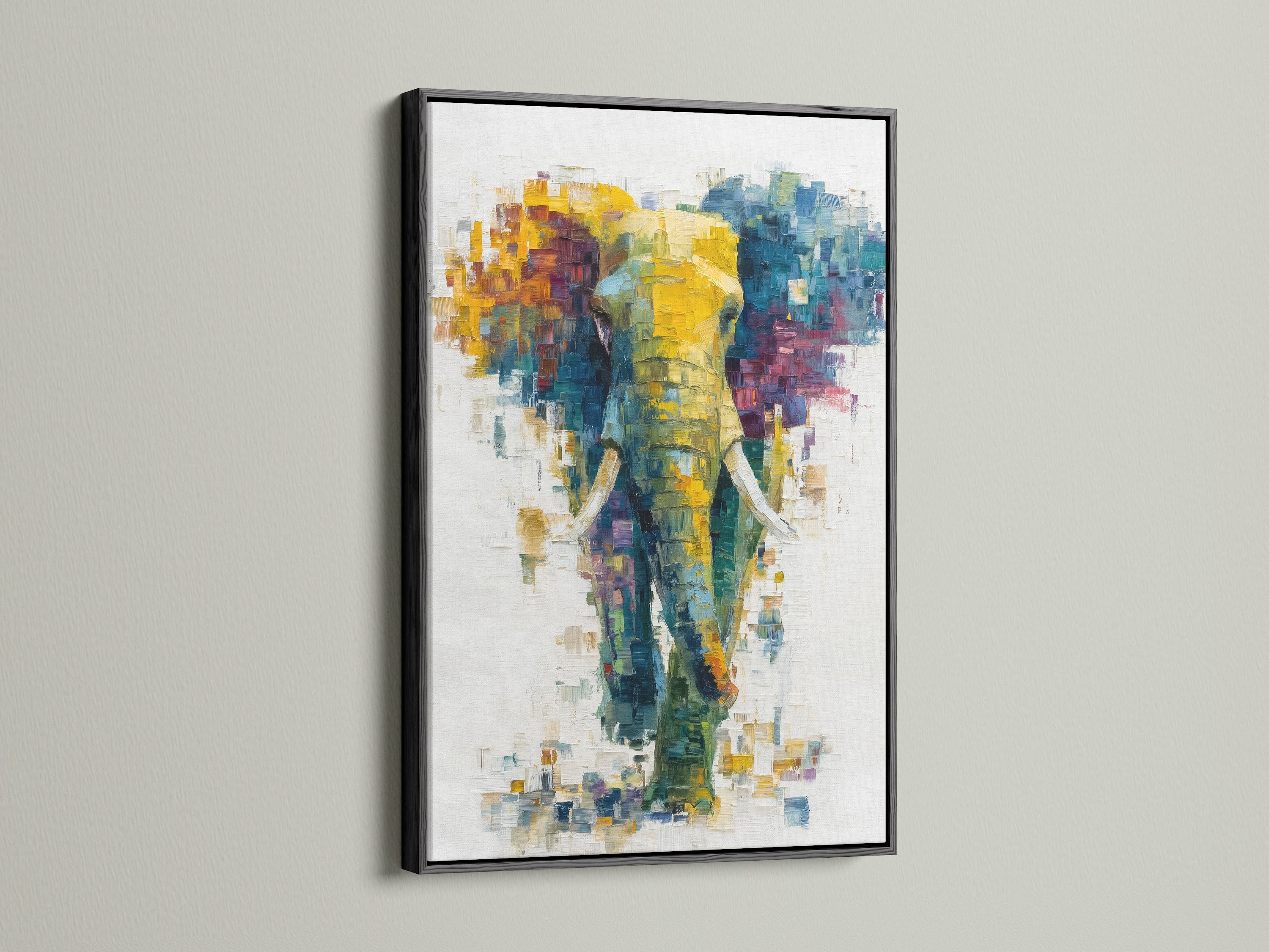This photo features an abstract elephant artwork in a sleek black frame. The contrast between the colorful canvas and the black frame creates a bold statement. A stylish choice for modern wall art.